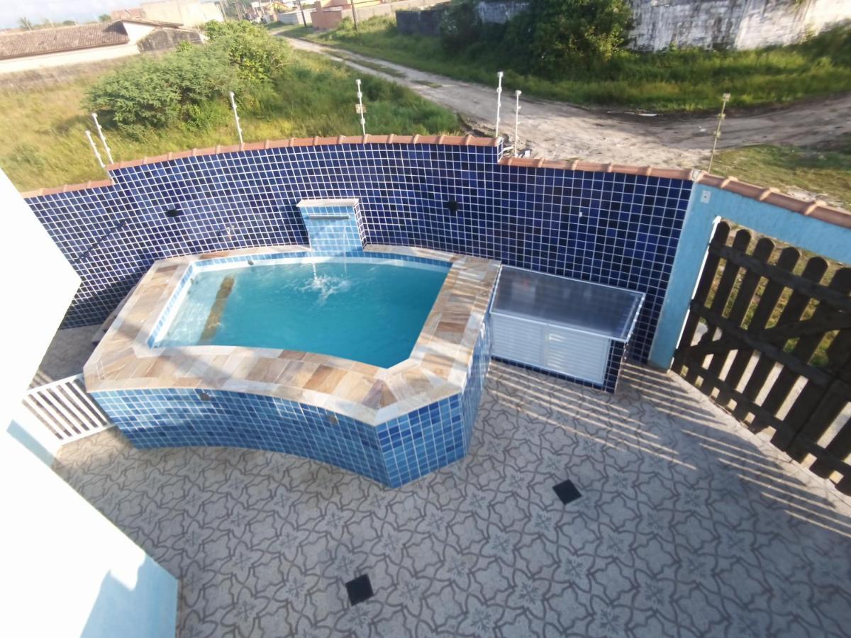 Casa com piscina , churrasqueira, Wi-Fi, em rua de Areia à 1km da praia, bairro sussegado, proíbido uso de som extremamente alto ideal para descansar Itanhaém Esterno foto